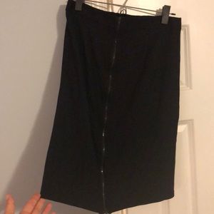 Theory black knee length skirt w/ zip back detail